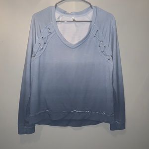 This fading blue long sleeve fits perfectly and is adorable for any occasion!